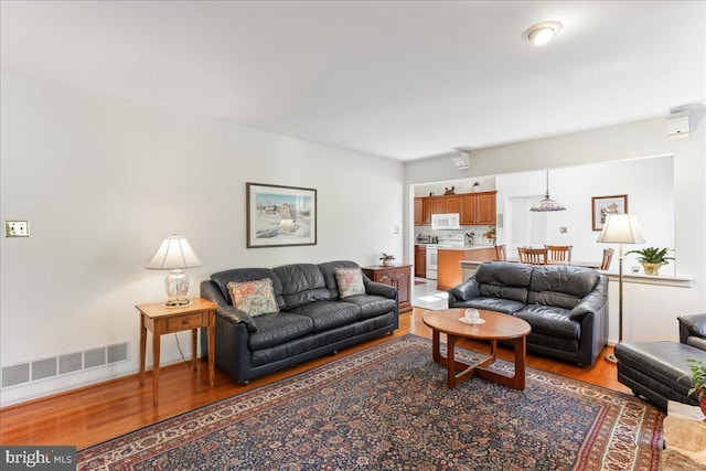 living room featuring hardwood / wood-style flooring