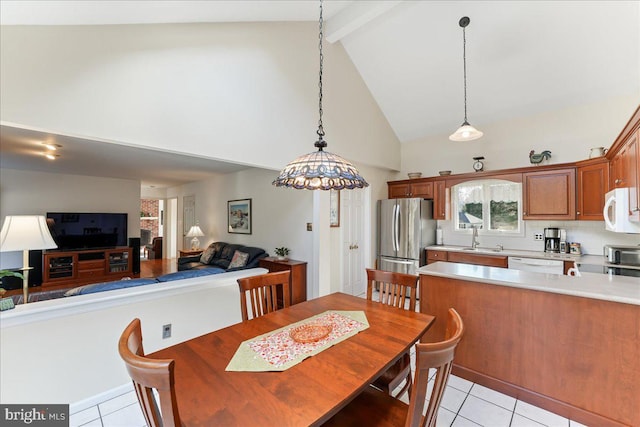 dining room featuring sink, high vaulted ceiling, beamed ceiling, and light tile patterned flooring