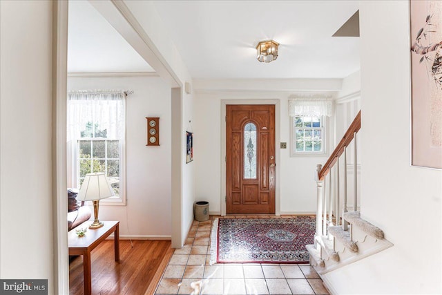 entryway with light hardwood / wood-style floors