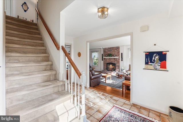 entryway featuring a fireplace