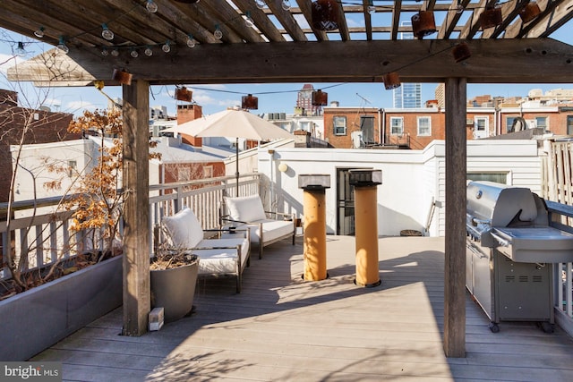 deck with an outdoor living space, area for grilling, and a pergola