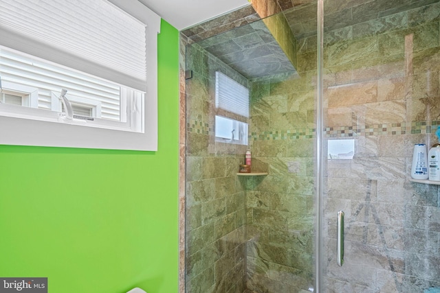 bathroom featuring walk in shower