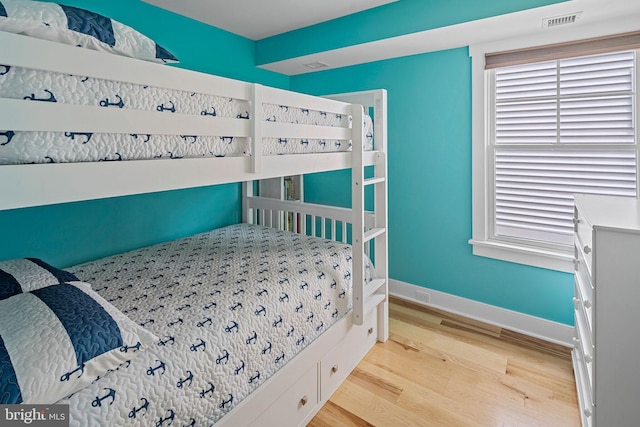 bedroom featuring light wood-type flooring