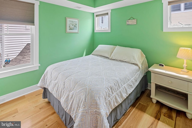 bedroom featuring light hardwood / wood-style flooring