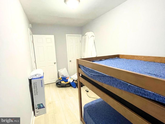 bedroom featuring wood-type flooring