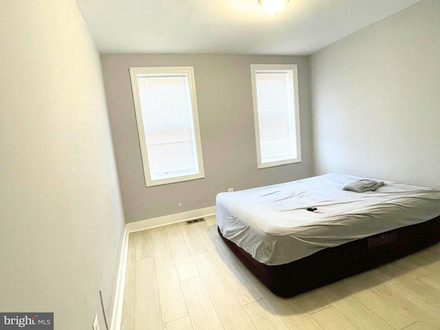 bedroom featuring light hardwood / wood-style flooring