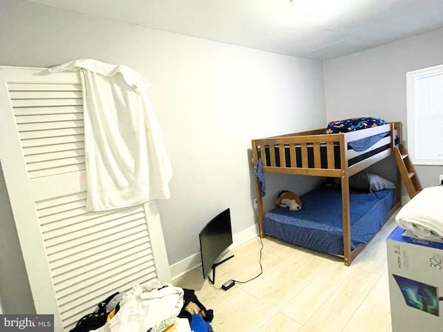 bedroom with light hardwood / wood-style floors