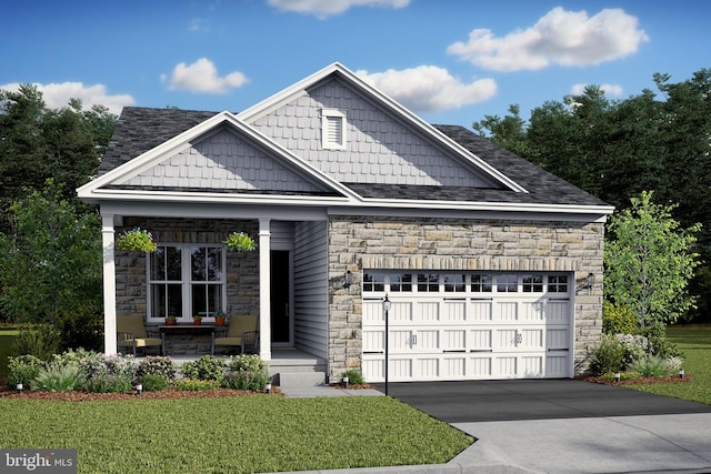 view of front facade featuring a garage and a front lawn