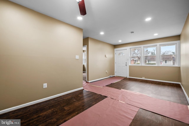 entryway with hardwood / wood-style floors