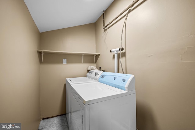 laundry area with washer and dryer