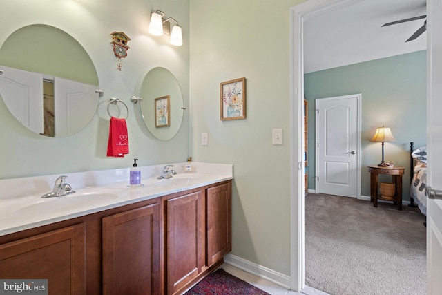 bathroom featuring vanity and ceiling fan