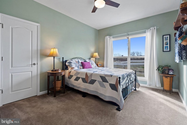 carpeted bedroom featuring ceiling fan