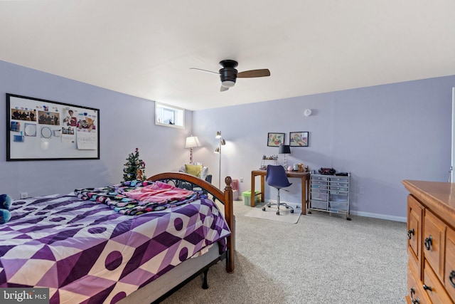 bedroom featuring light colored carpet and ceiling fan