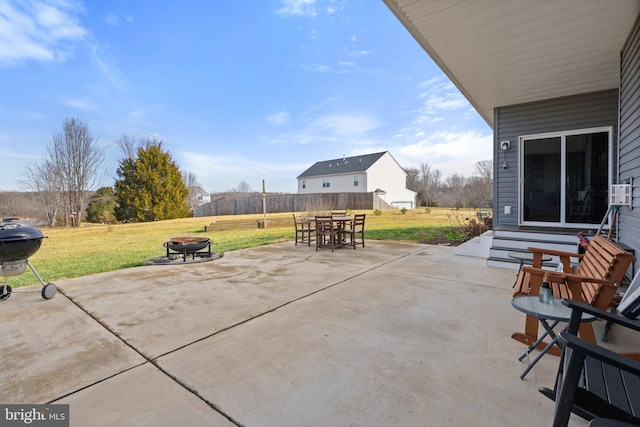 view of patio / terrace with area for grilling and an outdoor fire pit