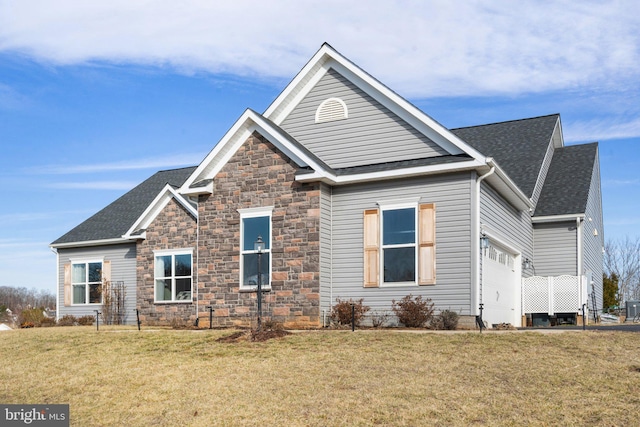 exterior space with a garage and a front lawn