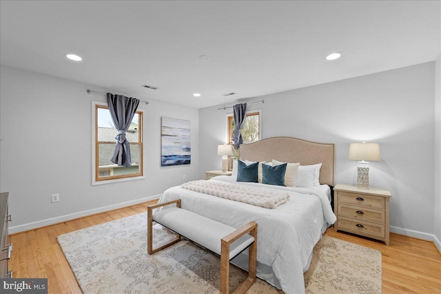 bedroom with light hardwood / wood-style floors