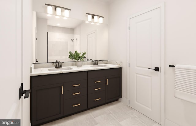 bathroom with vanity and a tile shower