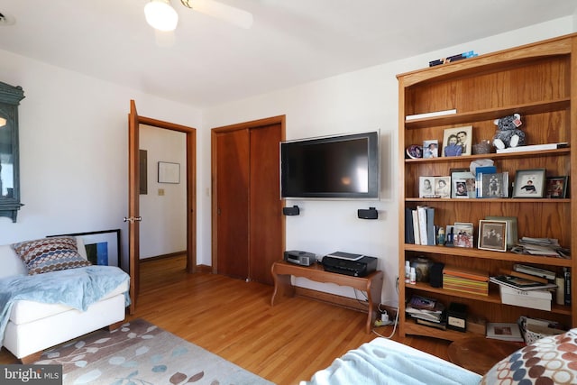 interior space with hardwood / wood-style floors and ceiling fan