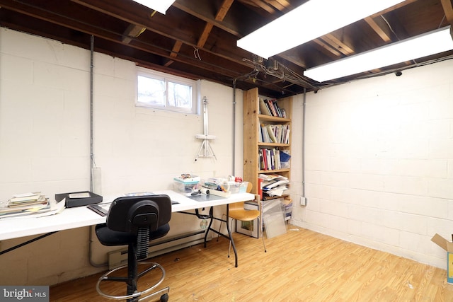 office space with light hardwood / wood-style floors