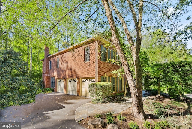 view of front of property featuring a garage