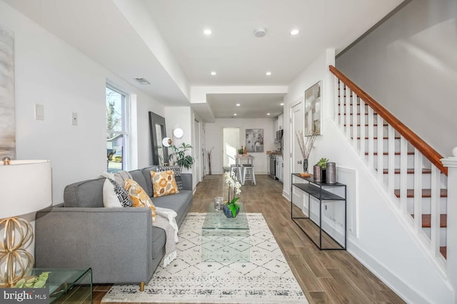 living room featuring wood-type flooring