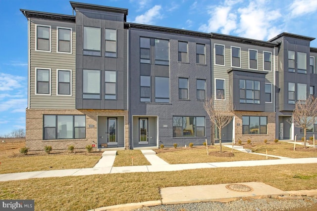 view of front of home with a front yard