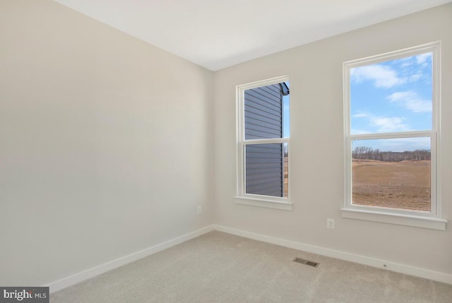 view of carpeted spare room