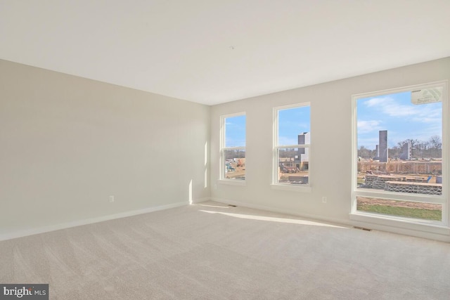 view of carpeted spare room