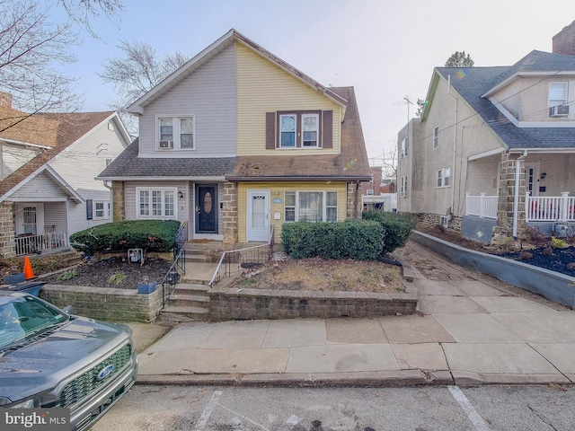 view of front of home with cooling unit