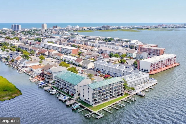 drone / aerial view with a water view