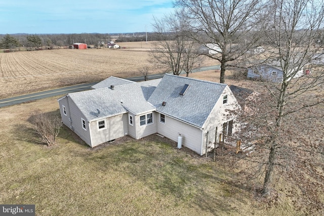 birds eye view of property featuring a rural view