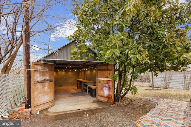 view of patio featuring an outdoor structure