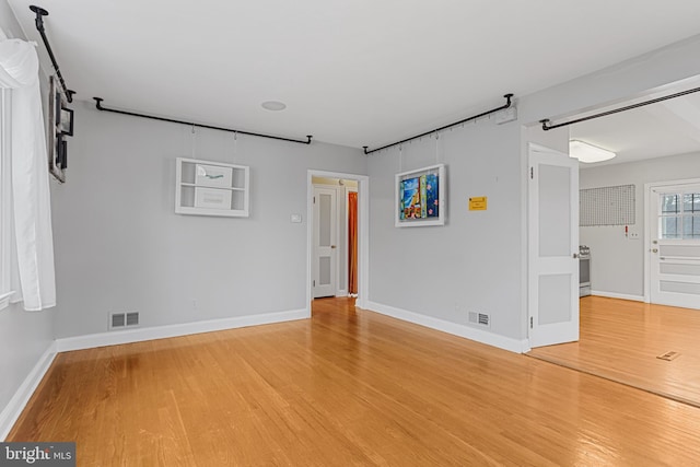 empty room featuring wood-type flooring