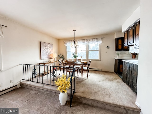 dining room featuring light carpet, baseboard heating, and a notable chandelier