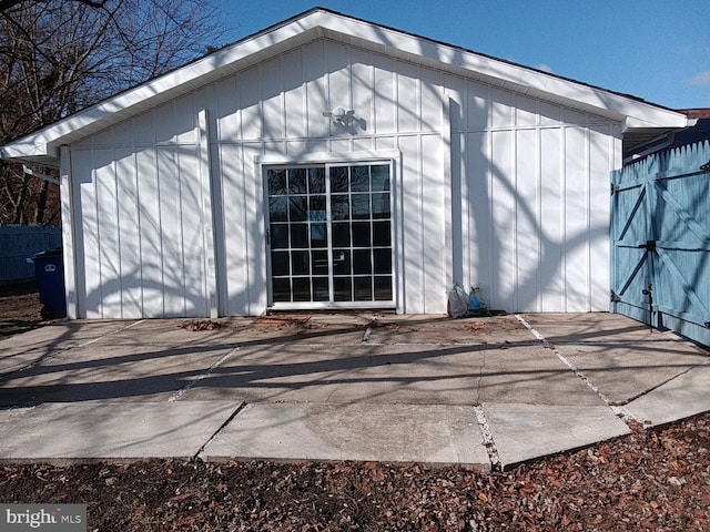 exterior space with fence and an outdoor structure