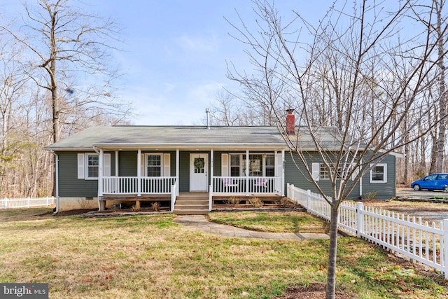 single story home with a front lawn, fence, covered porch, and a chimney