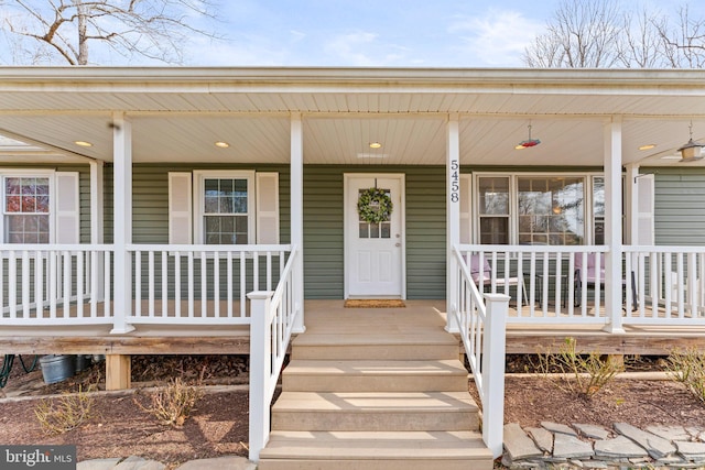 doorway to property with covered porch