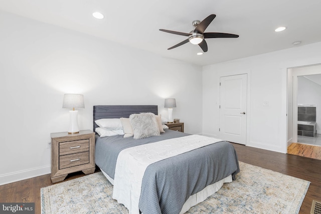 bedroom featuring dark wood-type flooring and ceiling fan