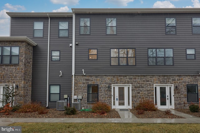 view of front of property featuring cooling unit