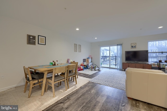 dining area featuring hardwood / wood-style floors