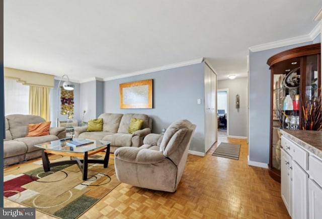 living room featuring ornamental molding and light parquet floors