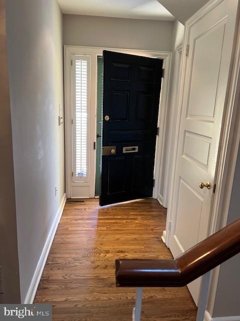 entryway with light hardwood / wood-style flooring