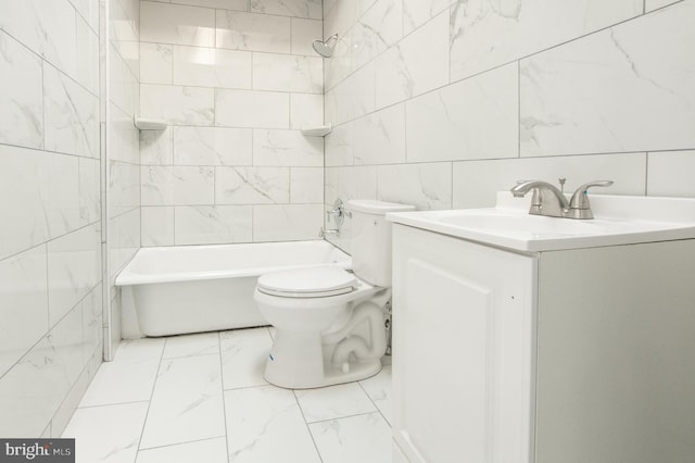 bathroom featuring tile walls, toilet, marble finish floor, and vanity