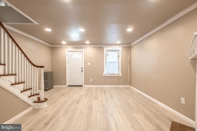 entryway featuring recessed lighting, light wood-style flooring, baseboards, and ornamental molding