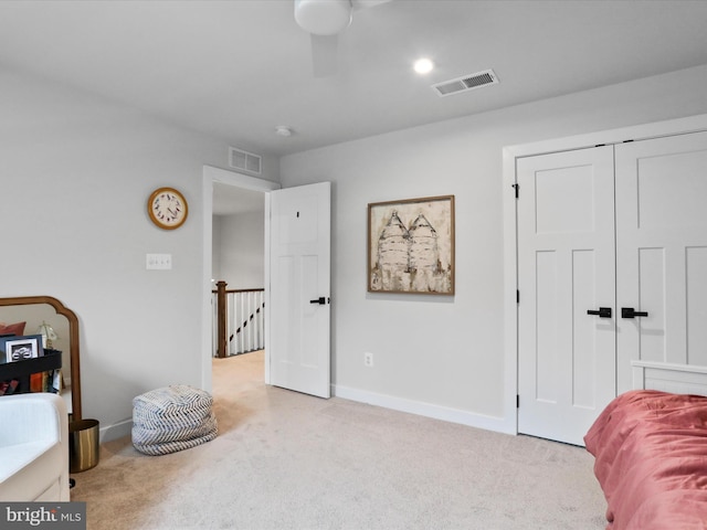 interior space featuring light carpet