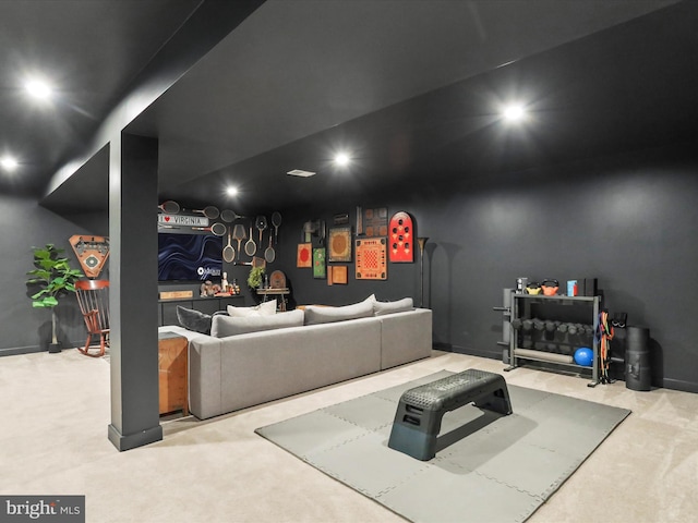 cinema room featuring carpet floors