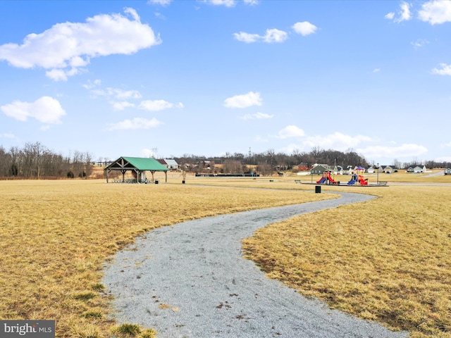 view of home's community with a gazebo and a playground