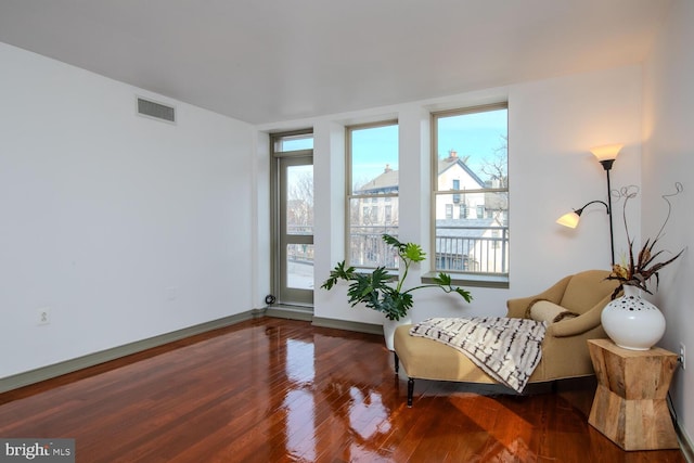 sitting room featuring hardwood / wood-style flooring