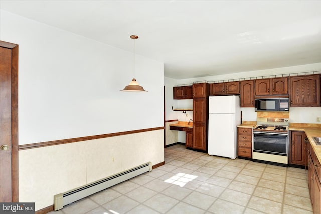 kitchen with a baseboard radiator, white appliances, and decorative light fixtures