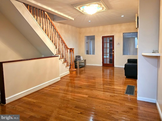 entryway with wood-type flooring